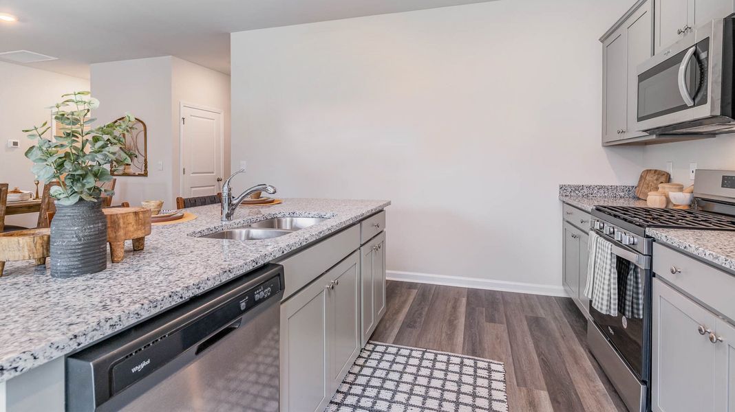 Representative furnished interior of a home built from the KENNER by D.R. Horton in Village Park, Oakland (Image 6).