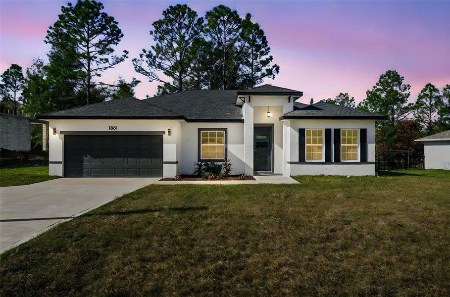 Front exterior of a new home in , Citrus Springs, FL, highlighting curb appeal (Image 20). Front exterior of a new home in , Citrus Springs, FL, highlighting curb appeal (Image 20).