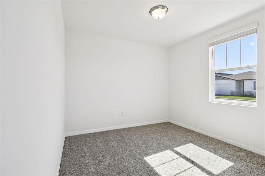 Spacious, unfurnished interior of a new home in Lake Deer Estates - Signature Series, Poinciana (Image 30).