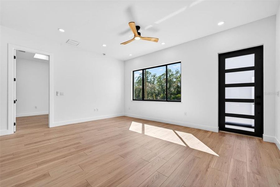 Spacious, unfurnished interior of a new home in , Port Charlotte (Image 32).