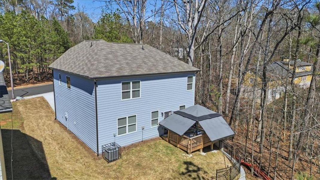 Exterior details and patio area of a home in Tell River, Atlanta (Image 32). Exterior details and patio area of a home in Tell River, Atlanta (Image 32).