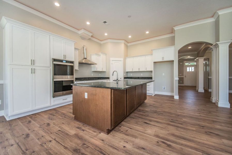 Representative furnished interior of a home built from the Beaumont Elite by Enchanted Homes in Pointe Summit, Slater-Marietta (Image 12).