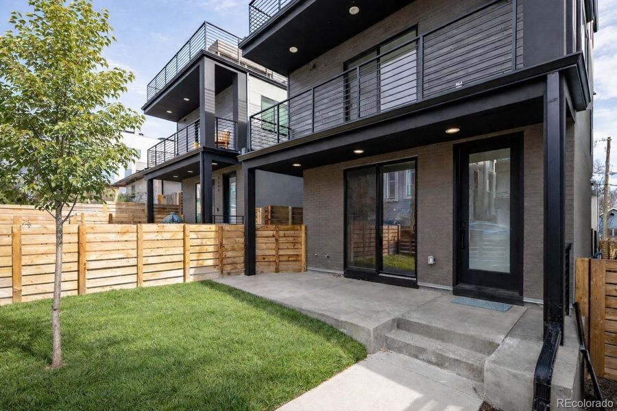 Private, gated front yard. Covered front porch with gas and water hookups. Enclosed dog run area to south of building.