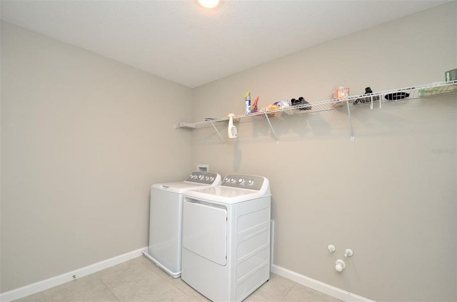Furnished interior view inside a new home in Seasons at Eden Hills, Lake Alfred (Image 31).
