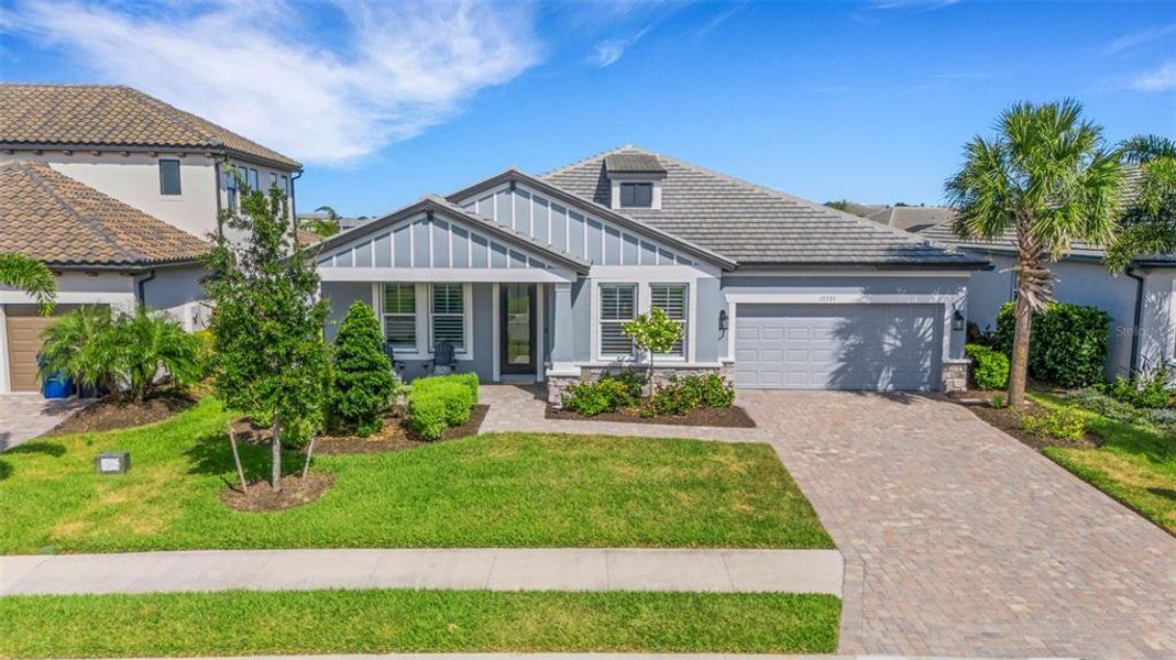 Front exterior of a new home in , Bradenton, FL, highlighting curb appeal (Image 25).
