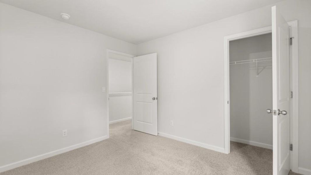 Spacious, unfurnished interior of a new home in Northwoods at Mirror Lake, Villa Rica (Image 32).