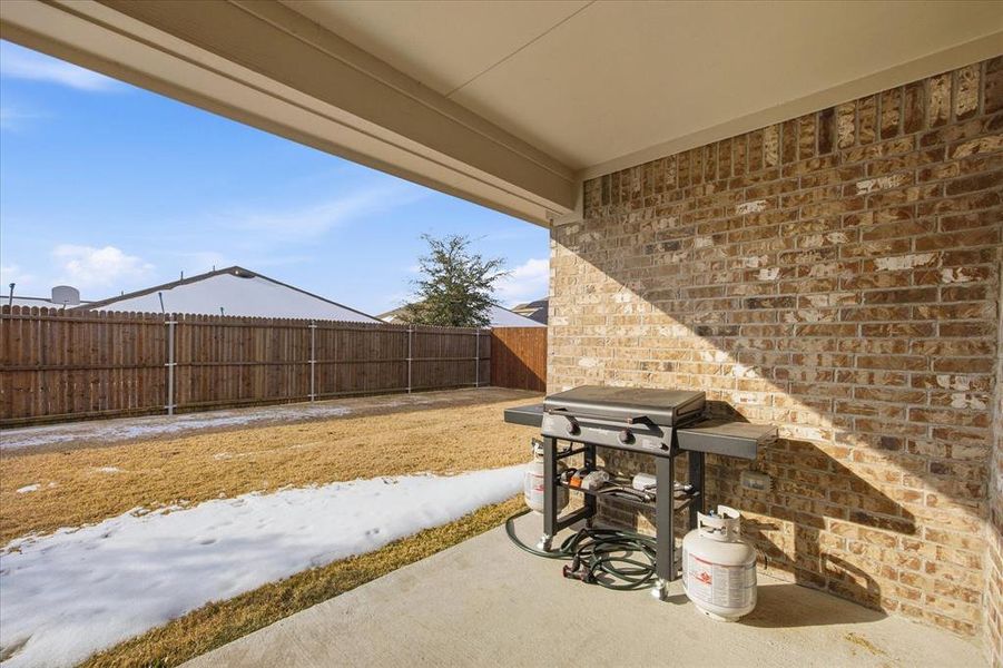 Exterior details and patio area of a home in Stonehaven, Caddo Mills (Image 3).