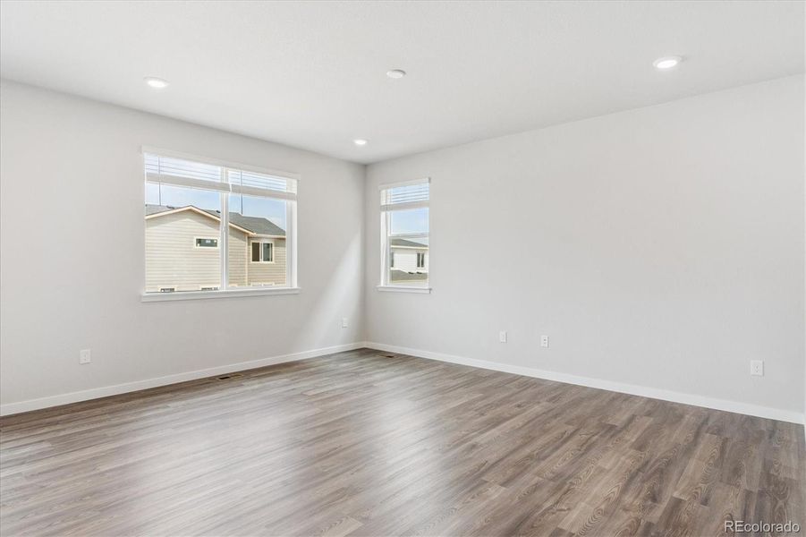 Spacious, unfurnished interior of a new home in Floret Collection at Alder Creek, Parker (Image 24).