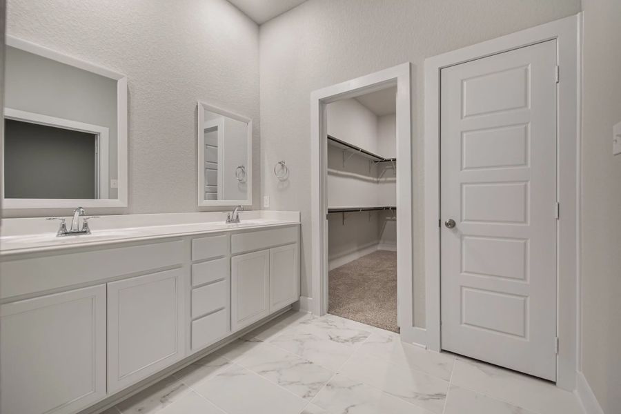 Representative furnished interior of a home built from the Sterling by Chesmar Homes in Stillwater Ranch, Buda (Image 11).