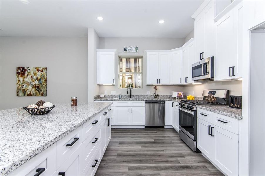 Lots of cabinets, with soft close cabinets and drawers.