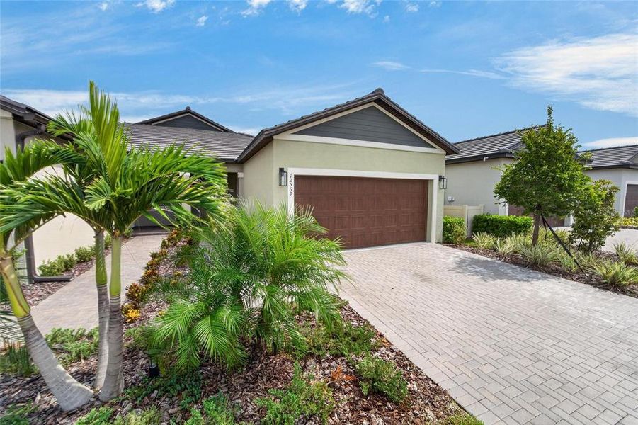 Front exterior of a new home in , Parrish, FL, highlighting curb appeal (Image 31).