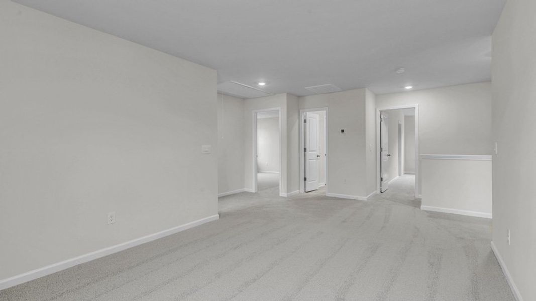 Representative unfurnished interior of a home built from the WILMINGTON by D.R. Horton in North Gate, Vass (Image 30).