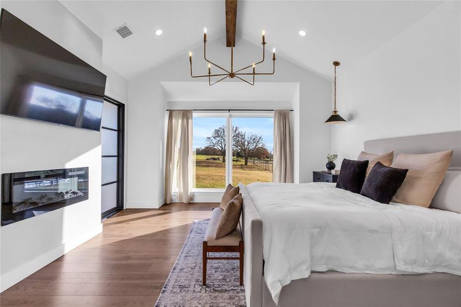 Primary bedroom with oversized window