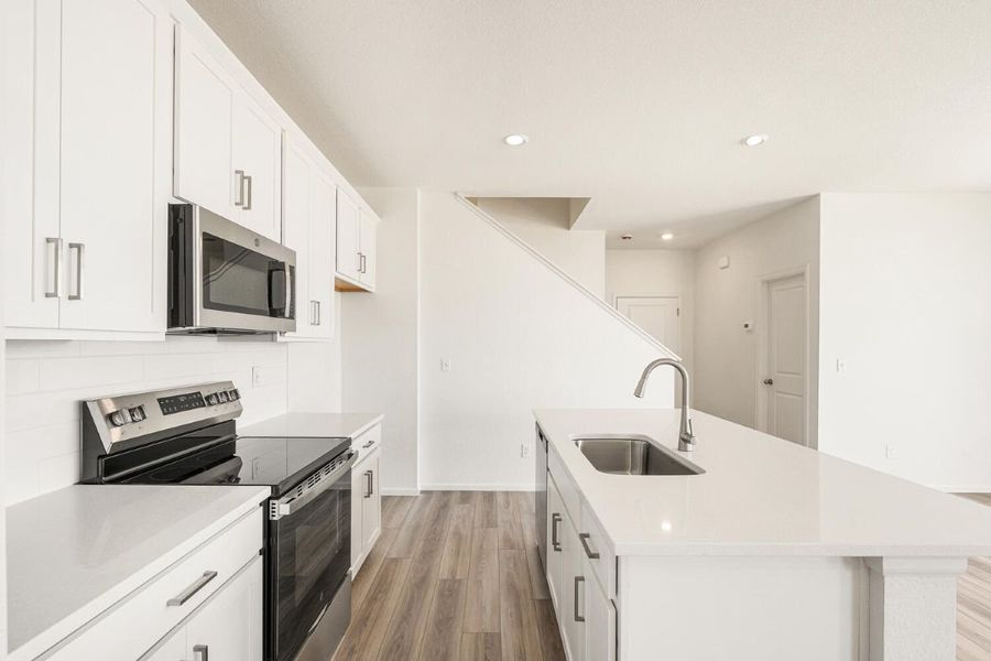 Furnished interior view inside a new home in Windler Villas, Aurora (Image 5).