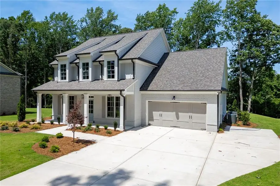 Front exterior of a new home in , Buford, GA, highlighting curb appeal (Image 28).