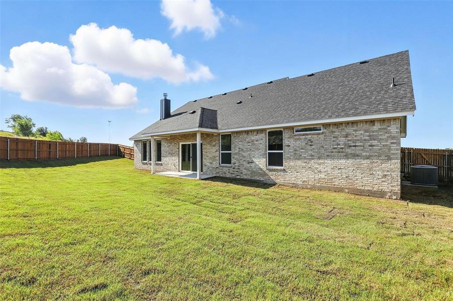 Front exterior of a new home in Stoneview, Glen Rose, TX, highlighting curb appeal (Image 2). Front exterior of a new home in Stoneview, Glen Rose, TX, highlighting curb appeal (Image 2).