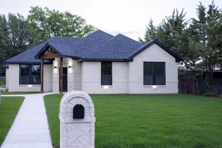 Front exterior of a new home in , Glenn Heights, TX, highlighting curb appeal (Image 19).