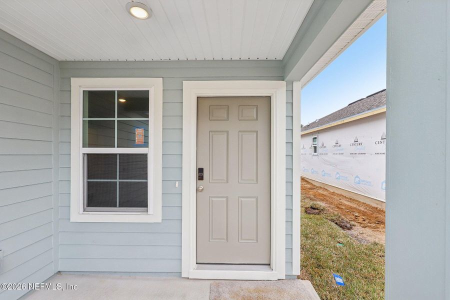 Exterior details and patio area of a home in Kings Landing, Jacksonville (Image 7).