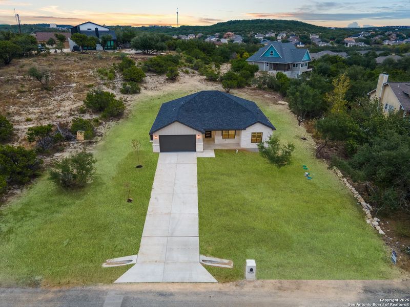Exterior details and patio area of a home in , San Antonio (Image 32).