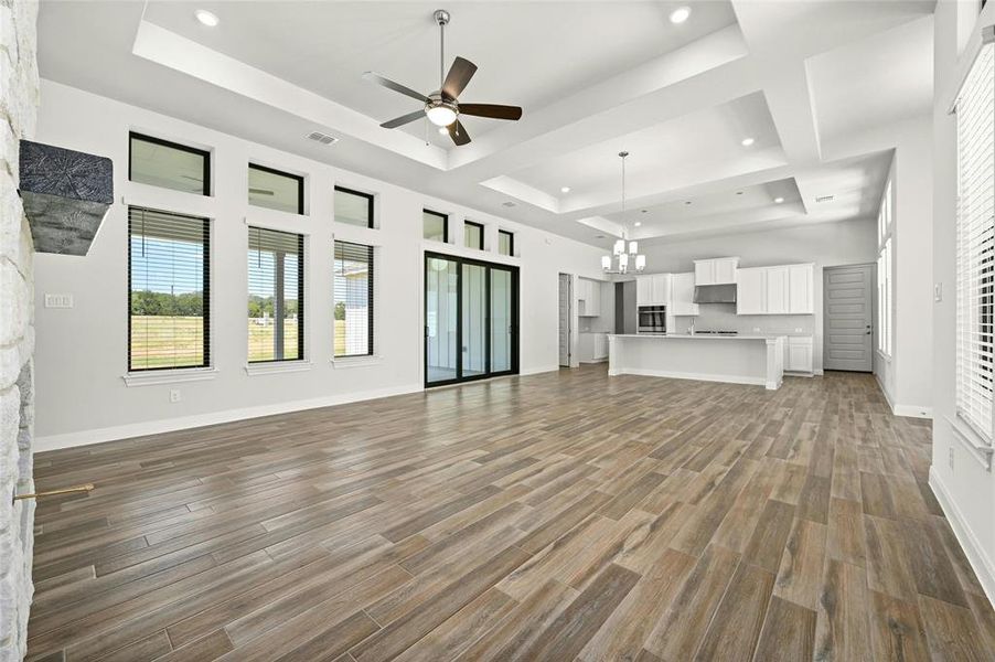 view from the family room looking towards the dining room and kitchen