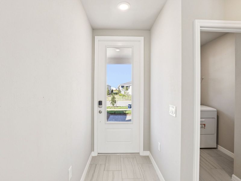 Spacious, unfurnished interior of a new home in Crescent Lakes - Premier Series, Punta Gorda (Image 8). Spacious, unfurnished interior of a new home in Crescent Lakes - Premier Series, Punta Gorda (Image 8).