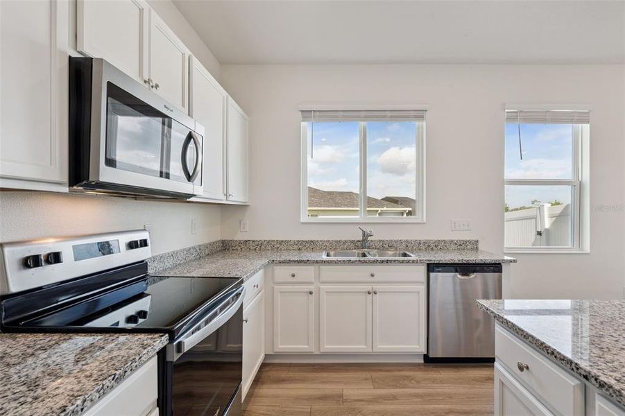 Furnished interior view inside a new home in , Mascotte (Image 42).