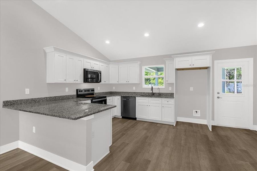 Furnished interior view inside a new home in , Dunnellon (Image 4).