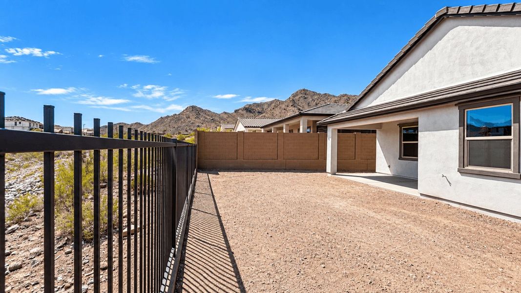 Exterior details and patio area of a home in The Ridge at Sienna Hills, Buckeye (Image 3).