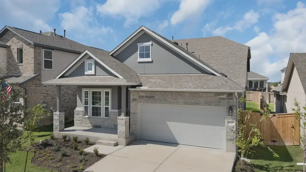 Front exterior of a new home in Nolina, Georgetown, TX, highlighting curb appeal (Image 2). Front exterior of a new home in Nolina, Georgetown, TX, highlighting curb appeal (Image 2).