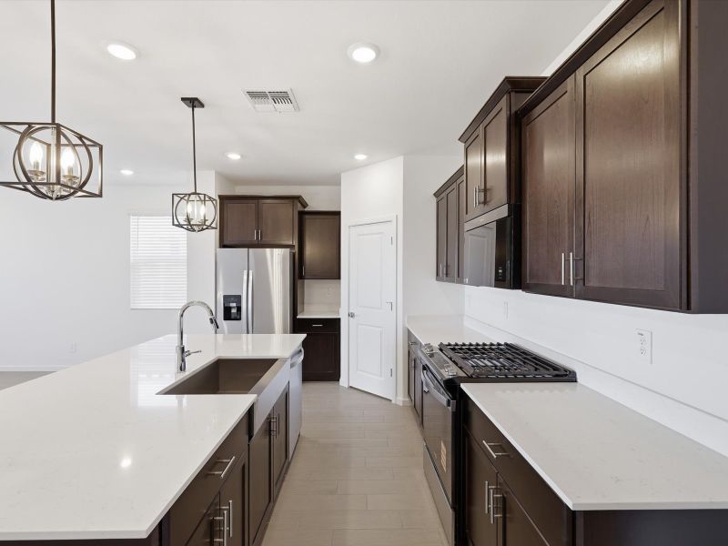 Furnished interior view inside a new home in Mountain View Estates Reserve Series, Buckeye (Image 3).