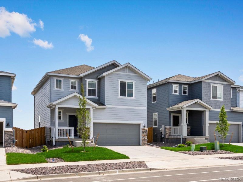 Front exterior of a new home in Lake Bluff, Greeley, CO, highlighting curb appeal (Image 2).