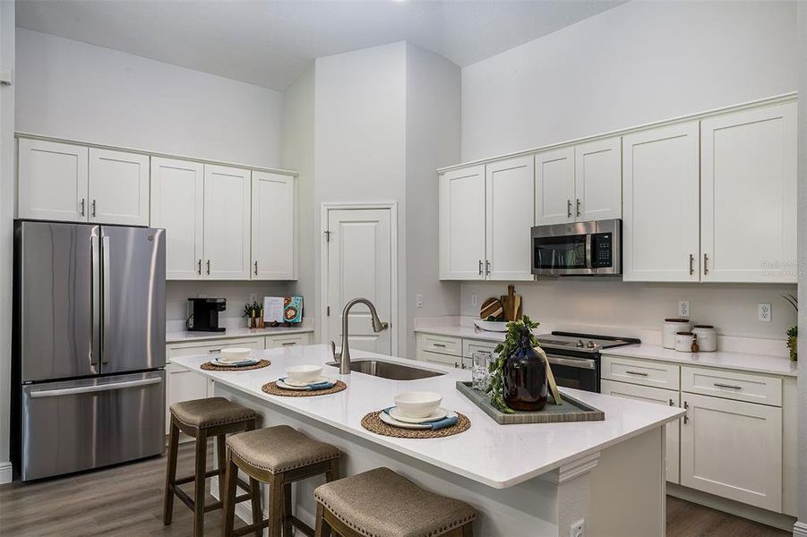 Furnished interior view inside a new home in Pasadena Landing, Wesley Chapel (Image 8).
