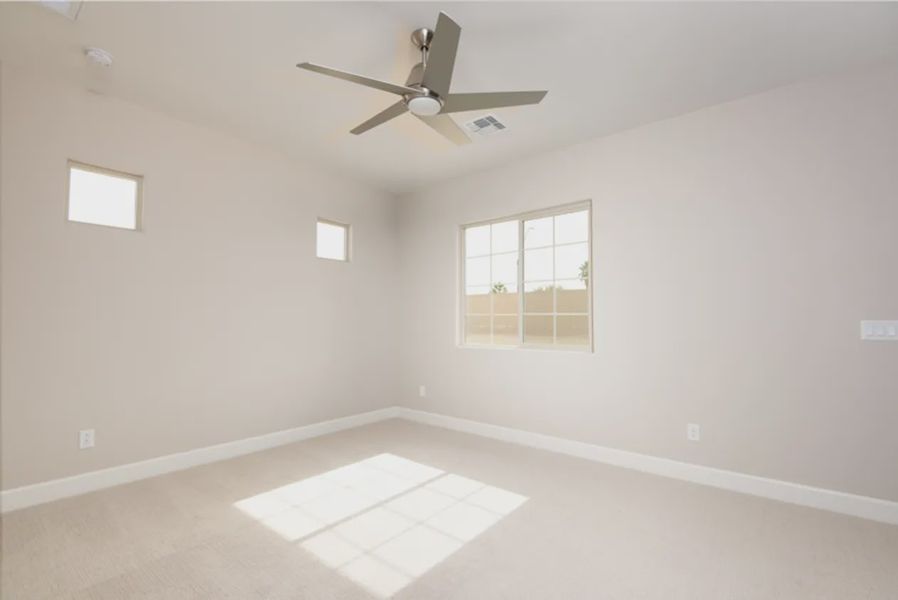 Spacious, unfurnished interior of a new home in Bellero Estates, Queen Creek (Image 23).