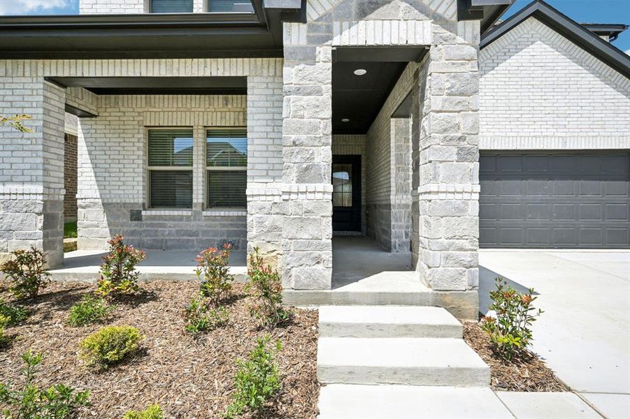 Exterior details and patio area of a home in Eastridge - Signature Series, McKinney (Image 2). Exterior details and patio area of a home in Eastridge - Signature Series, McKinney (Image 2).