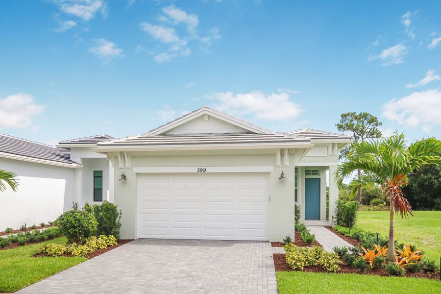 Front exterior of a new home in Rivella, Port St. Lucie, FL, highlighting curb appeal (Image 2).