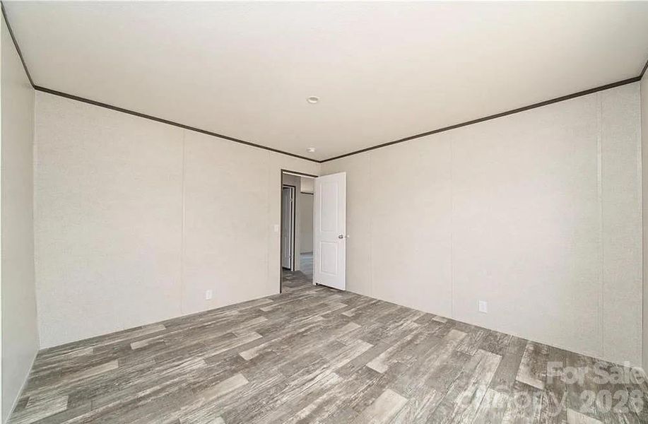 Spacious, unfurnished interior of a new home in , Lenoir (Image 7).