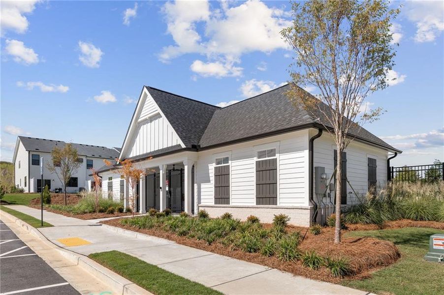 Front exterior of a new home in Sherwood Square, Flowery Branch, GA, highlighting curb appeal (Image 2).