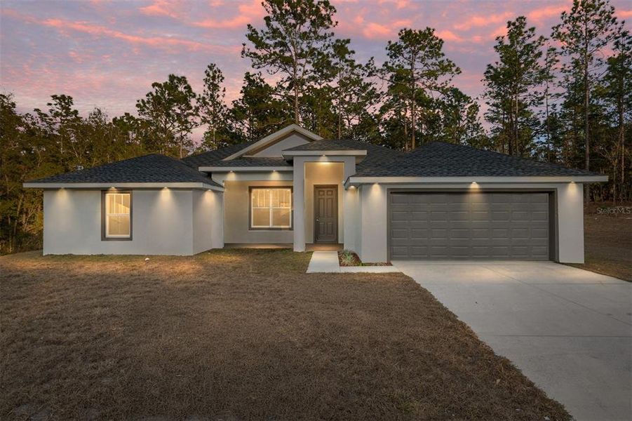 Front exterior of a new home in , Dunnellon, FL, highlighting curb appeal (Image 28).