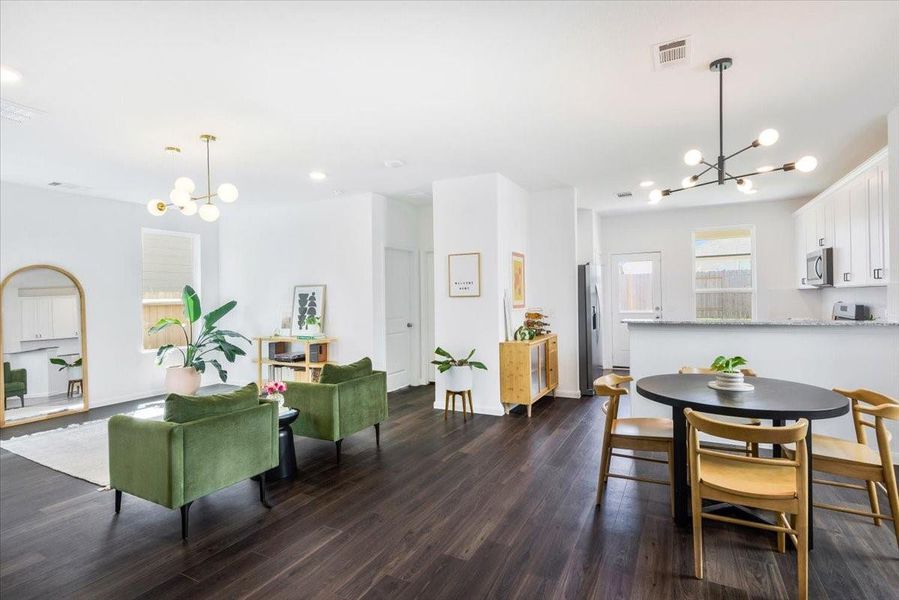 Home features updated custom lighting and neutral color scheme.