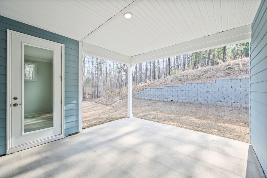 Exterior details and patio area of a home in Grand Arbor, Blythewood (Image 21).