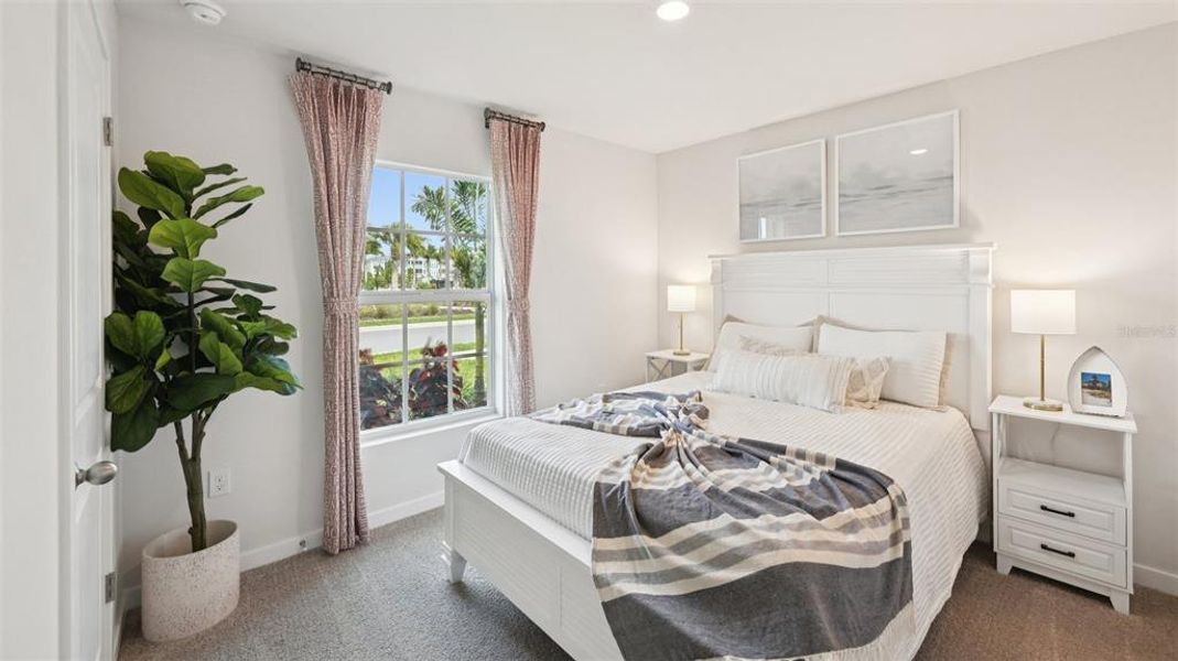 Furnished interior view inside a new home in Cove at West Port - Express, Port Charlotte (Image 9).