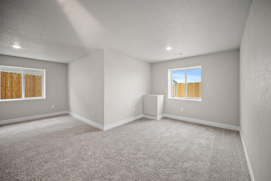 Spacious, unfurnished interior of a new home in Ridge at Lorson Ranch, Colorado Springs (Image 33).