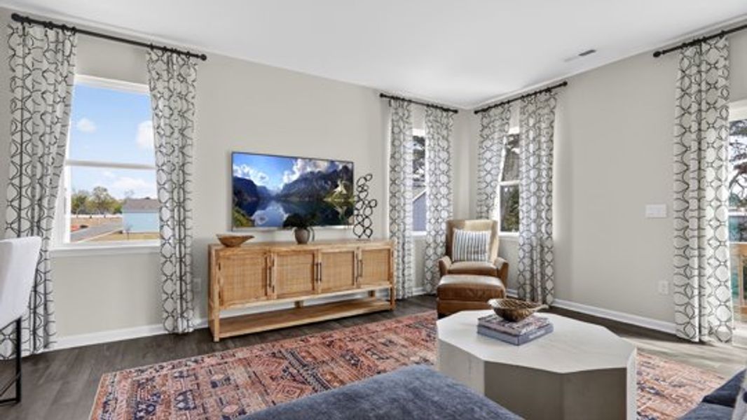 Furnished interior view inside a new home in The Townes at Madden West, Fuquay Varina (Image 9). Furnished interior view inside a new home in The Townes at Madden West, Fuquay Varina (Image 9).