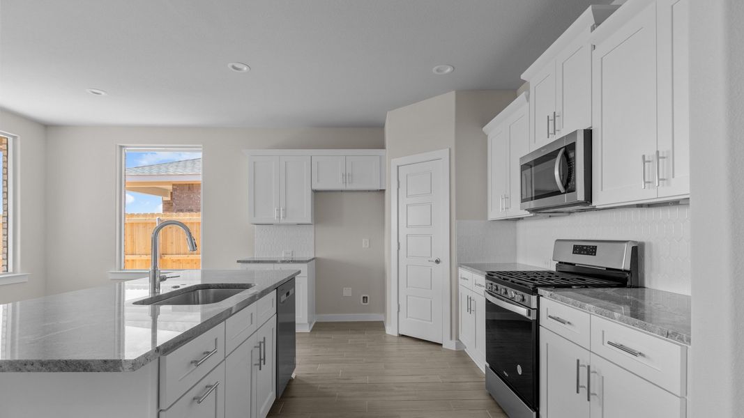 Representative furnished interior of a home built from the CARLSBAD by D.R. Horton in Northwest Passage, Midland (Image 5). Representative furnished interior of a home built from the CARLSBAD by D.R. Horton in Northwest Passage, Midland (Image 5).