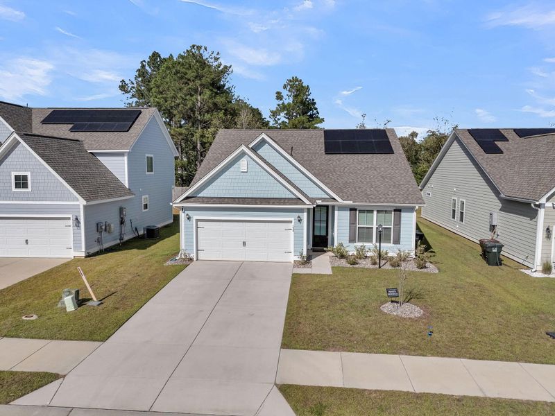 Front exterior of a new home in Abbey Walk, Moncks Corner, SC, highlighting curb appeal (Image 27).