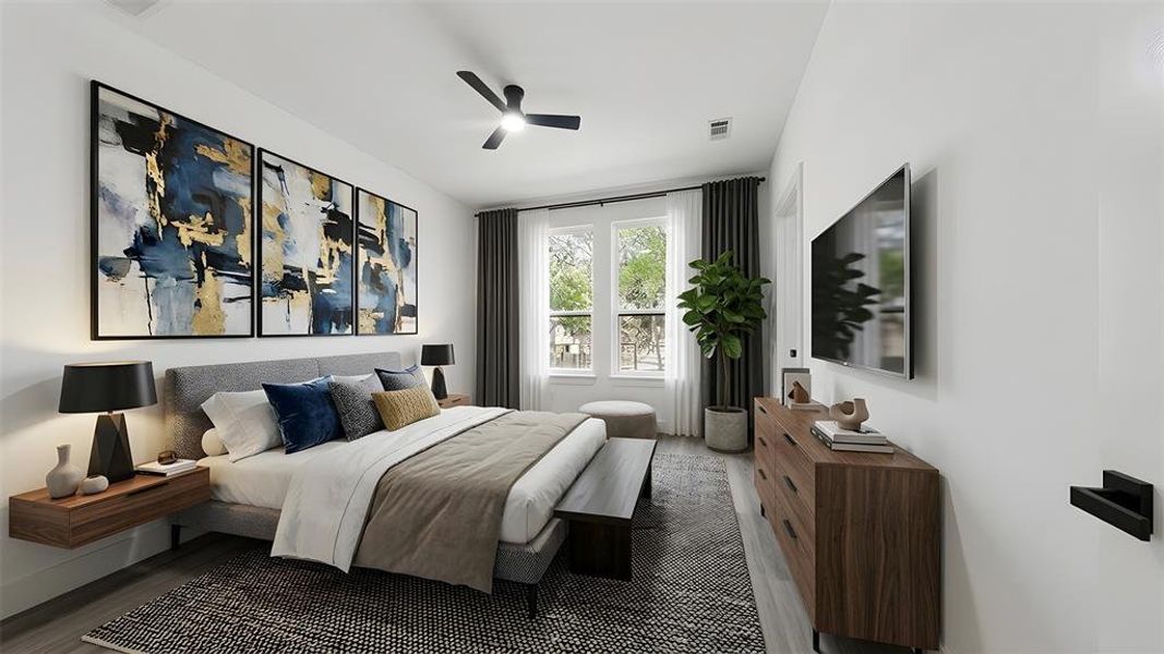 Bedroom with wood finished floors and ceiling fan