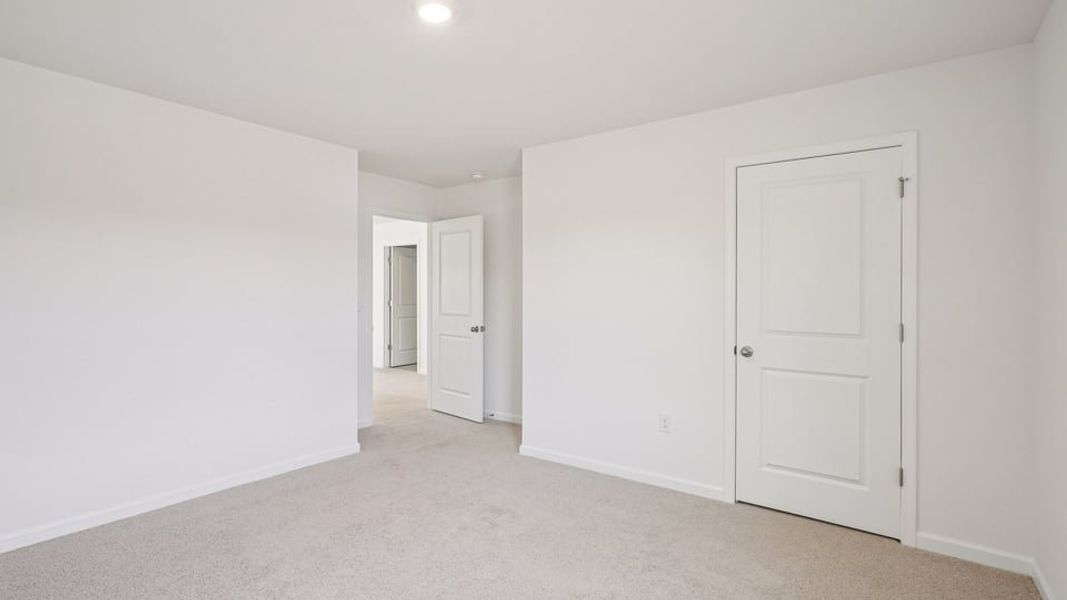 Spacious, unfurnished interior of a new home in Eagle Creek, Fuquay Varina (Image 28). Spacious, unfurnished interior of a new home in Eagle Creek, Fuquay Varina (Image 28).