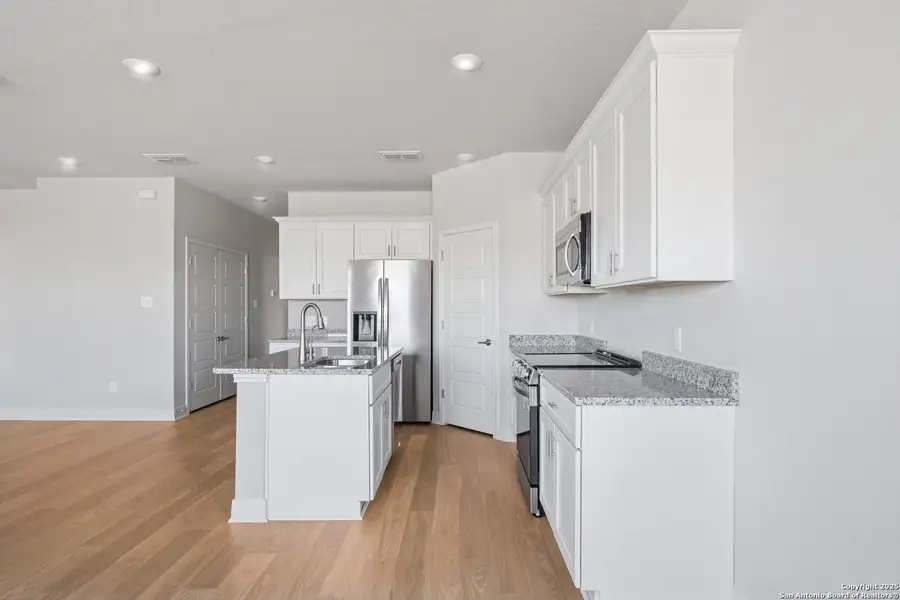 Furnished interior view inside a new home in Magnolia Village North, San Antonio (Image 16).