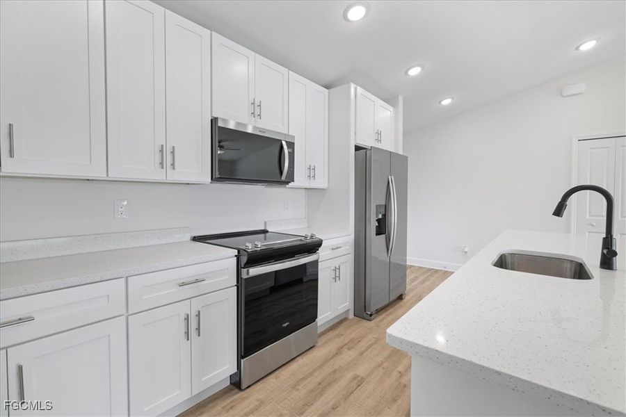 Furnished interior view inside a new home in Cape Coral, Cape Coral (Image 9).