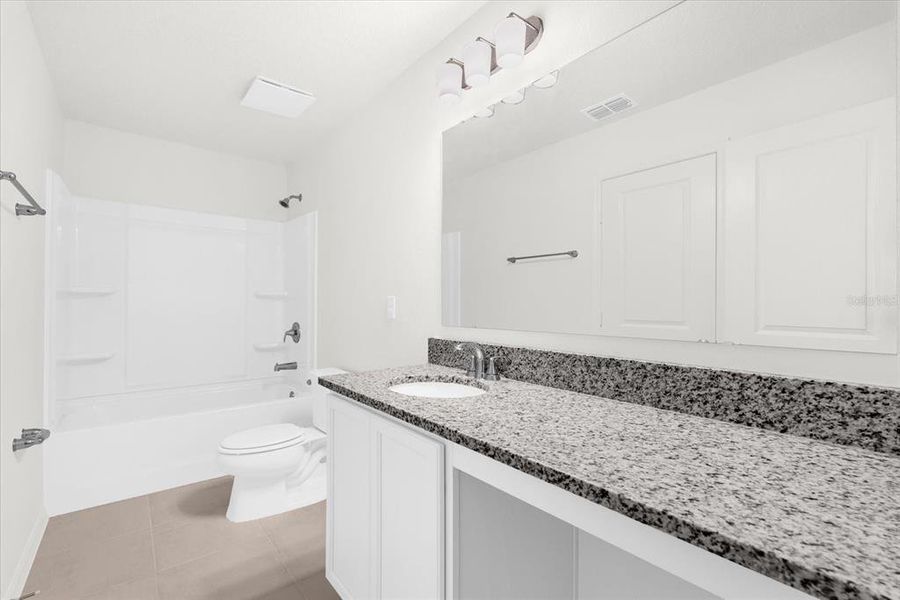 Furnished interior view inside a new home in Bellaviva III at Westside, Davenport (Image 8).